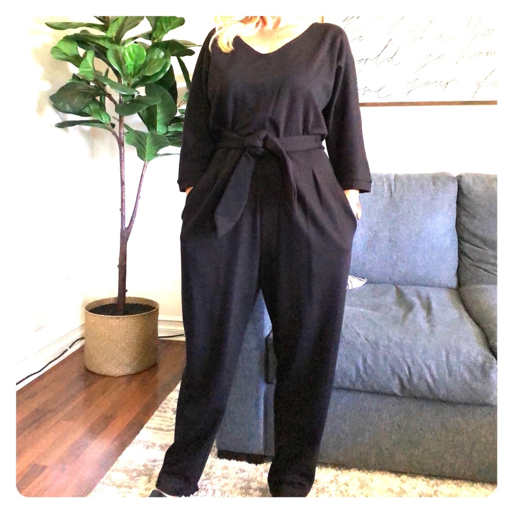 Anthropologie long sleeve romper in black